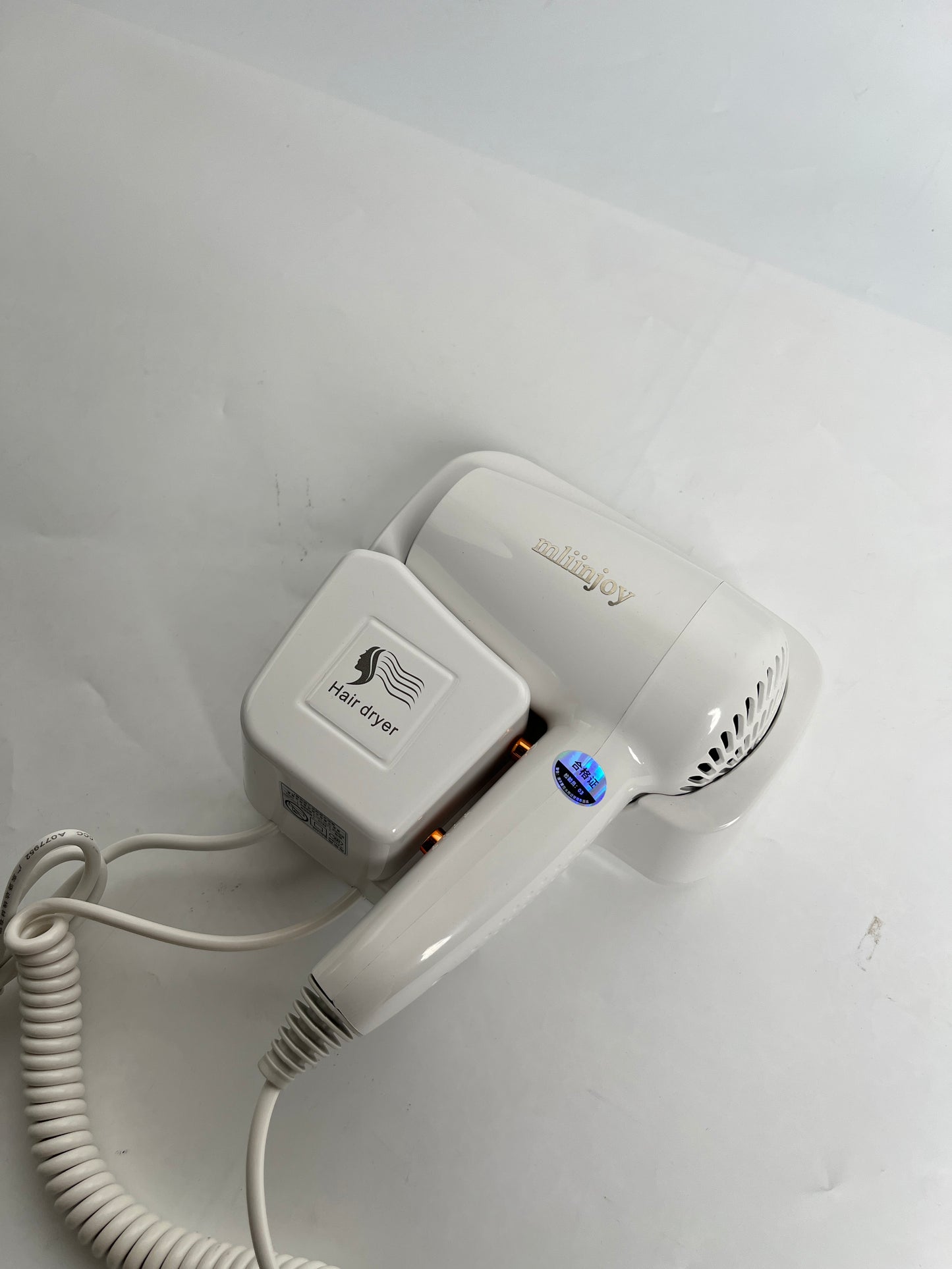 mliinjoy Wall-Mount Hair Dryer – Compact & Safe for Home & Hotel Use