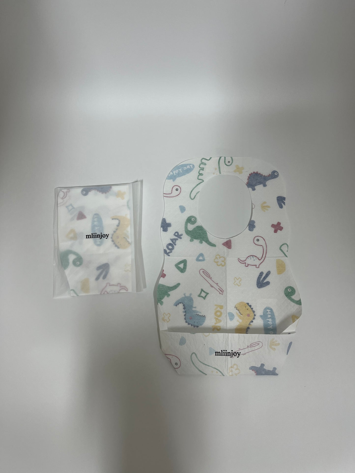 mliinjoy Disposable Baby Bibs – Waterproof Paper Feeding Bibs with Catch Pocket for Travel & Mealtime Mess Control (Pack of 10)
