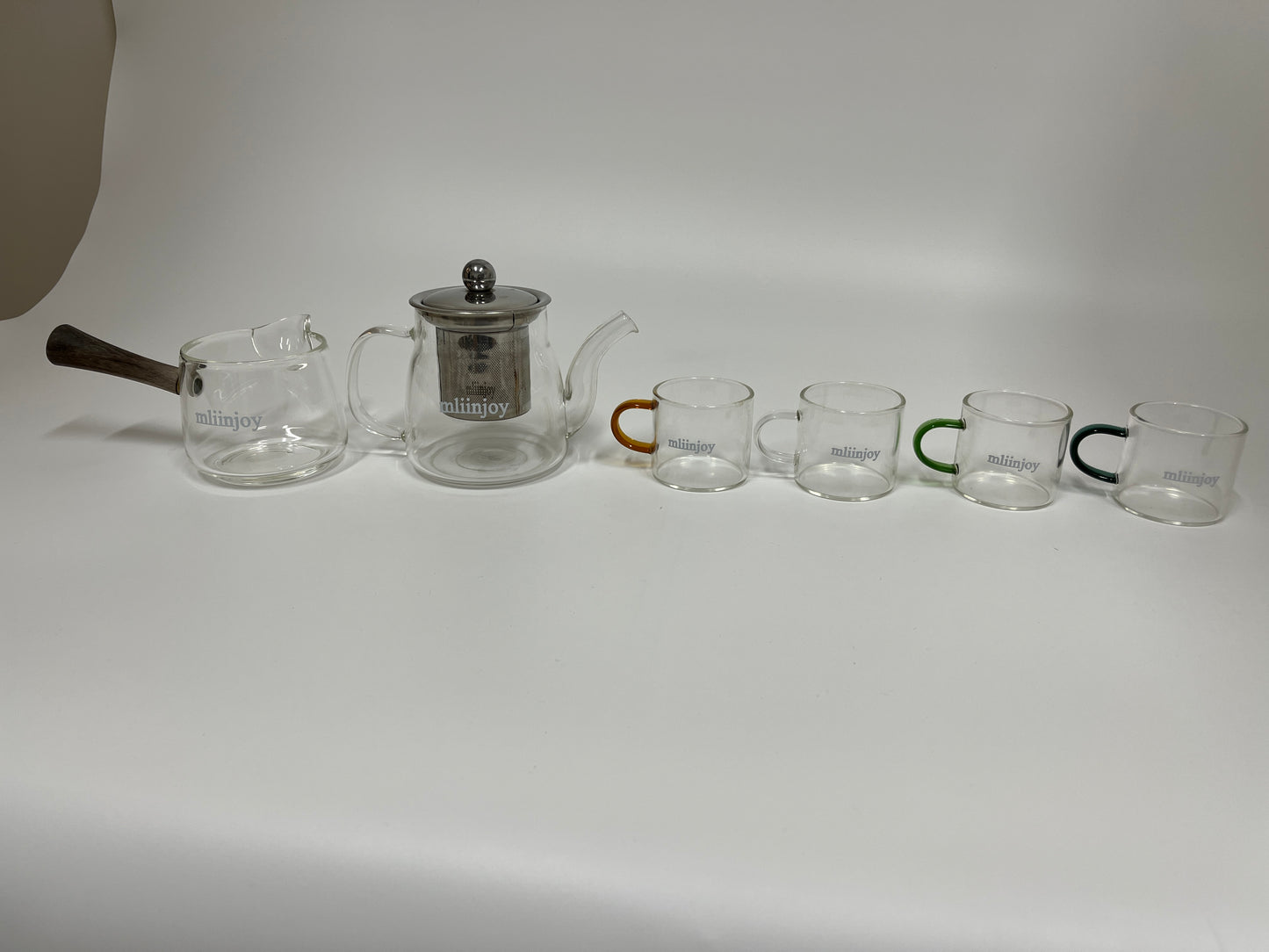 mliinjoy Glass Tea Set – 8-Piece Clear Teapot and Cup Set with Wood Handle & Stainless Steel Infuser for Gongfu or Modern Tea Service